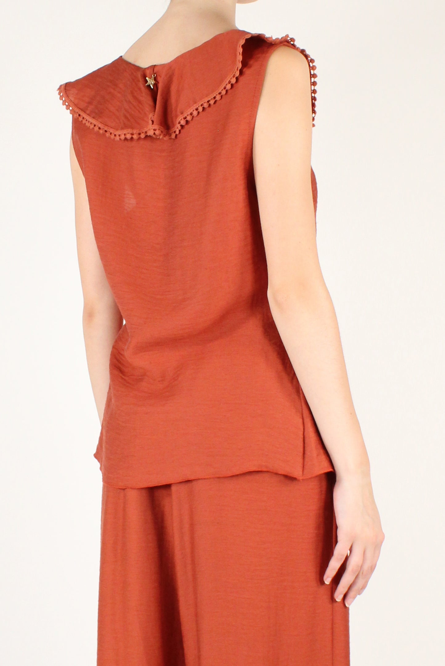 Sleeveless Top with Ruffles