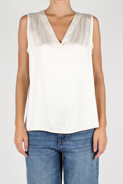 Sleeveless V-Neck Over Blouse