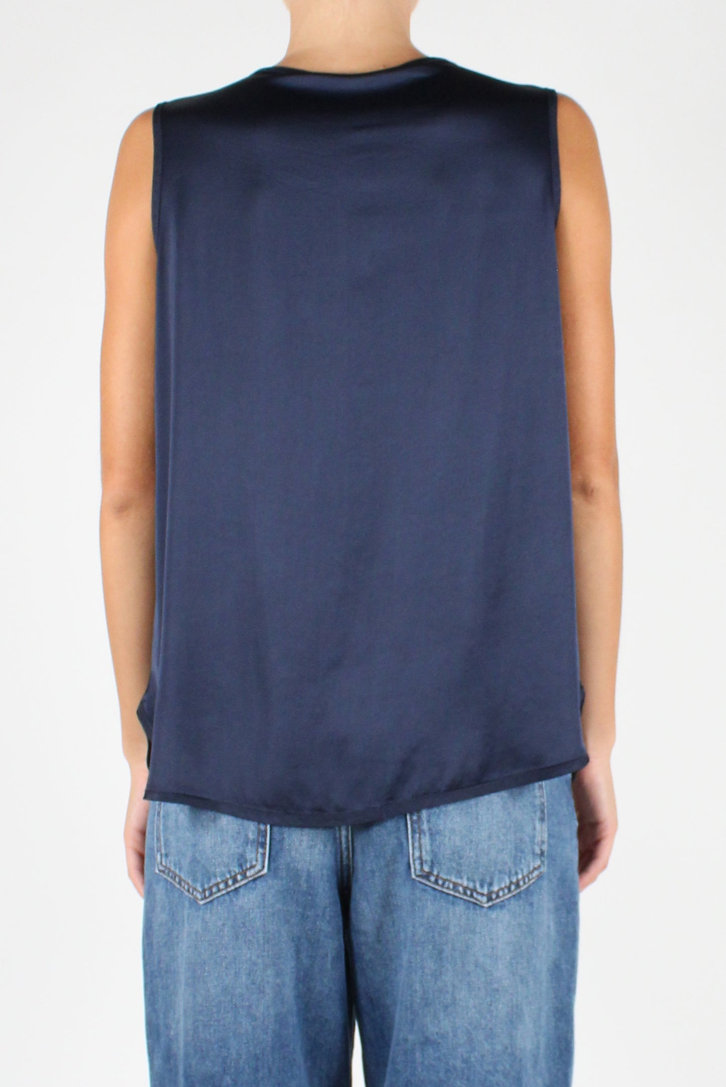 Sleeveless V-Neck Over Blouse