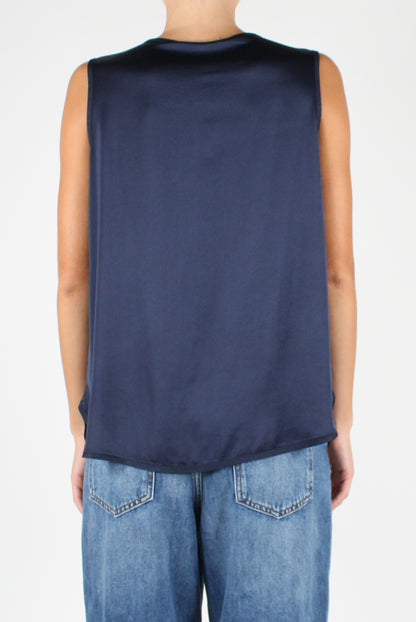 Sleeveless V-Neck Over Blouse