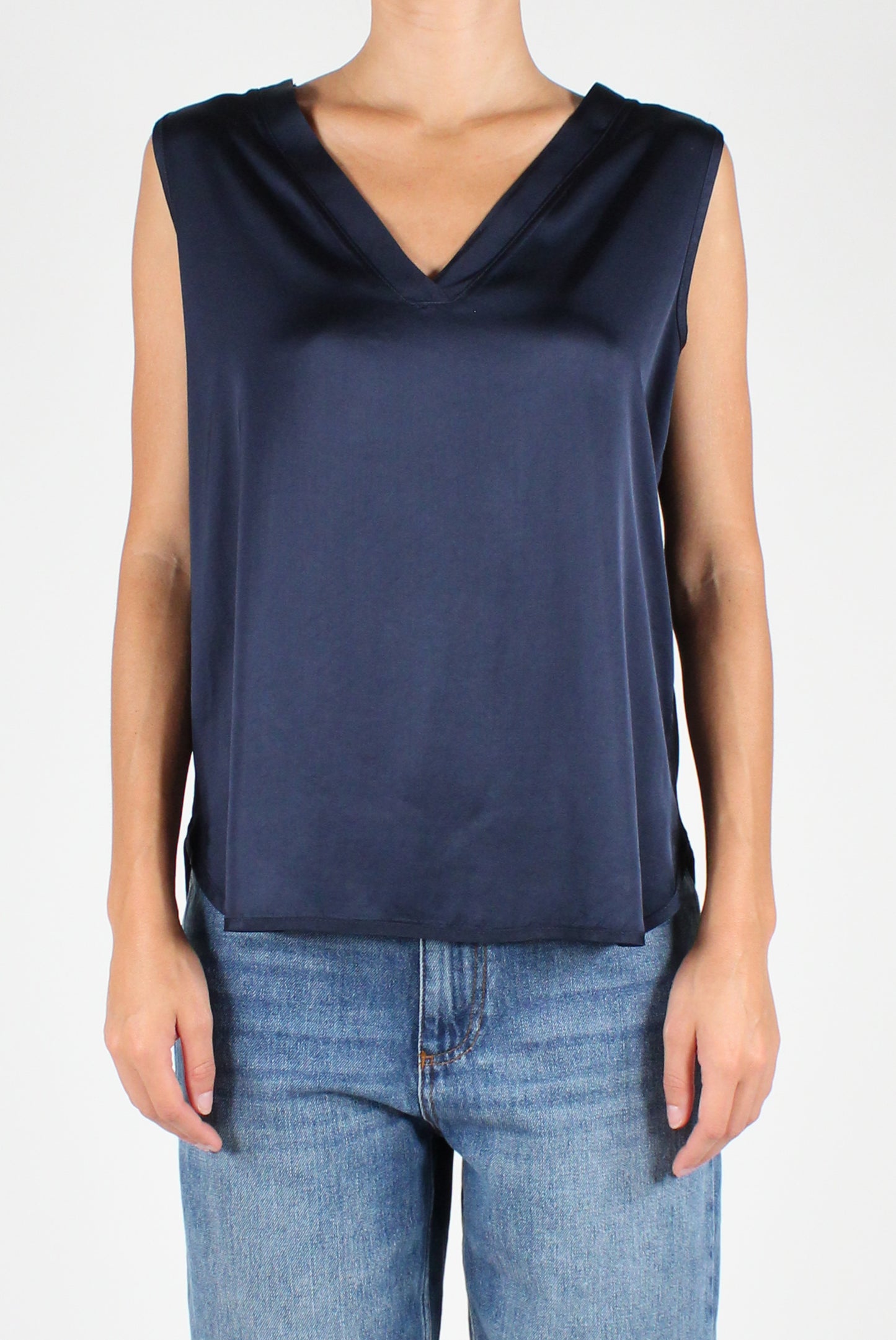 Sleeveless V-Neck Over Blouse