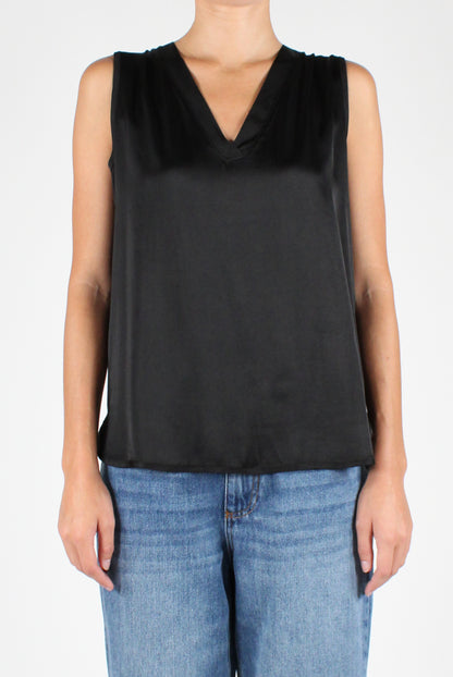 Sleeveless V-Neck Over Blouse