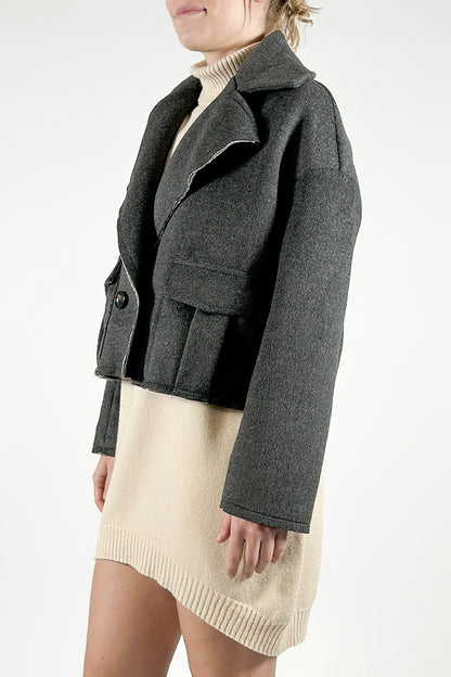 Double-breasted jacket in woolen cloth with raw cut edges
