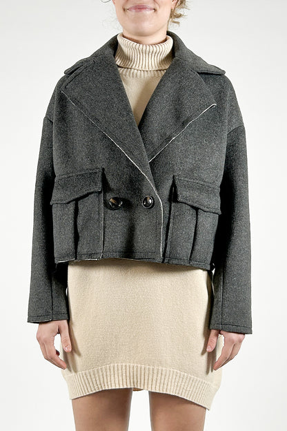 Double-breasted jacket in woolen cloth with raw cut edges