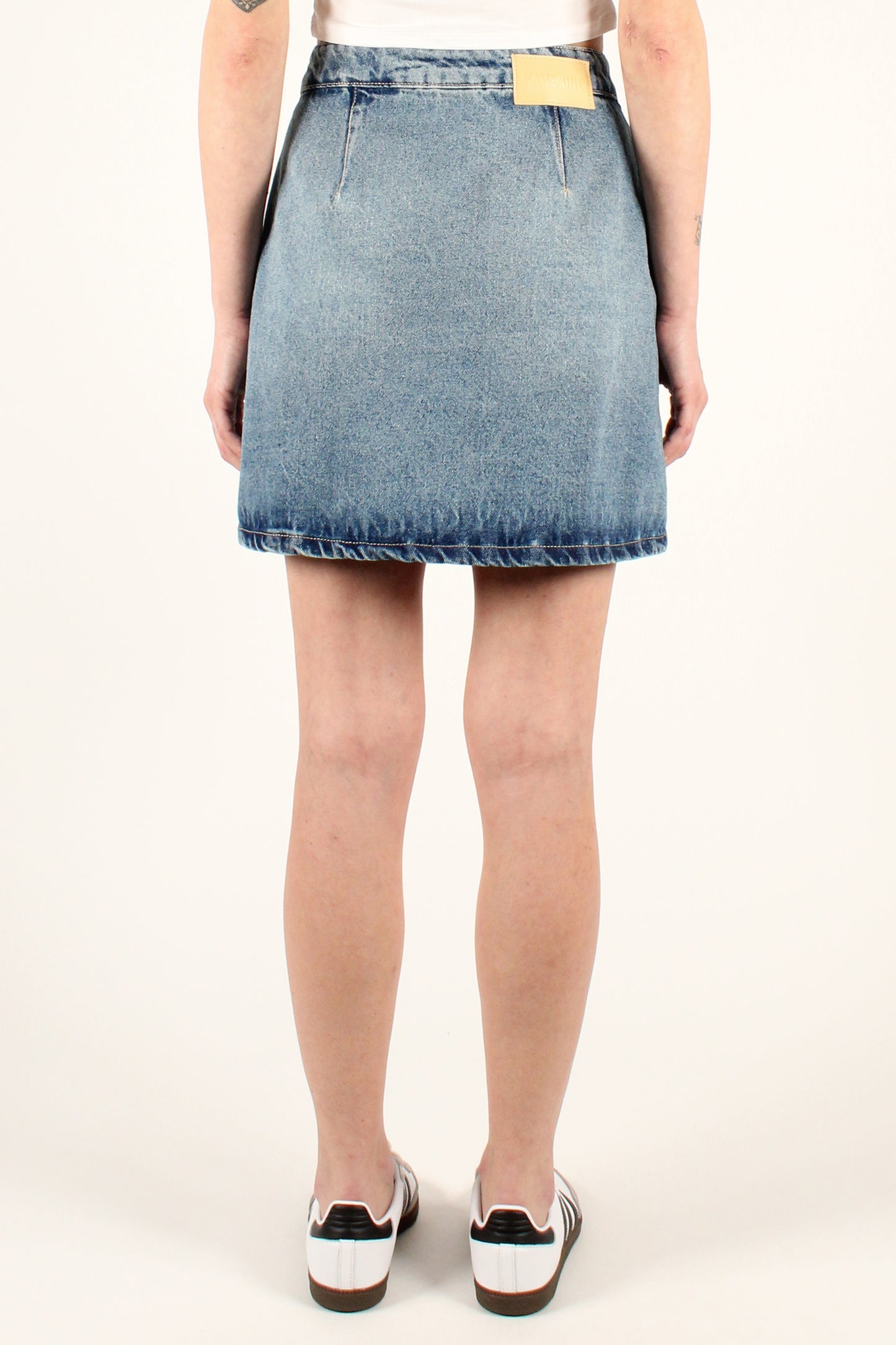 Denim mini skirt with patch pockets