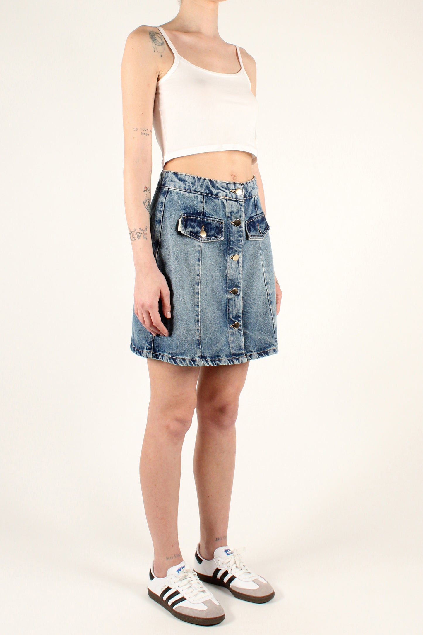 Denim mini skirt with patch pockets